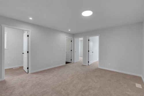 76 Heirloom Drive Se, Calgary, AB - Indoor Photo Showing Other Room