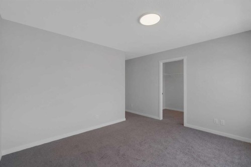 76 Heirloom Drive Se, Calgary, AB - Indoor Photo Showing Other Room