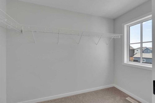 76 Heirloom Drive Se, Calgary, AB - Indoor With Storage