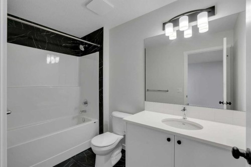 76 Heirloom Drive Se, Calgary, AB - Indoor Photo Showing Bathroom