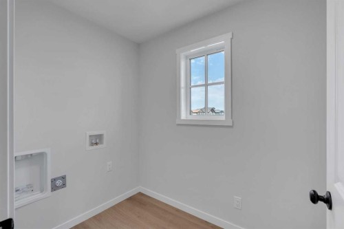 76 Heirloom Drive Se, Calgary, AB - Indoor Photo Showing Other Room