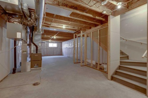 76 Heirloom Drive Se, Calgary, AB - Indoor Photo Showing Basement