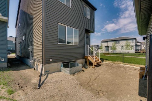 76 Heirloom Drive Se, Calgary, AB - Outdoor With Exterior