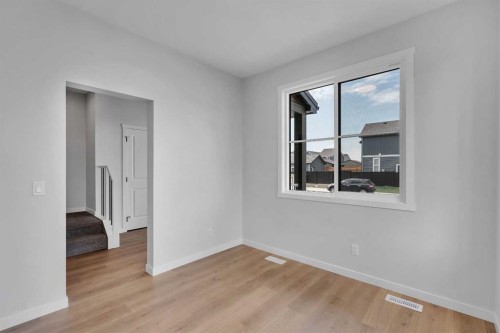 76 Heirloom Drive Se, Calgary, AB - Indoor Photo Showing Other Room