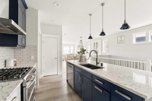 123 Crestridge Hill Sw, Calgary, AB - Indoor Photo Showing Kitchen With Double Sink With Upgraded Kitchen