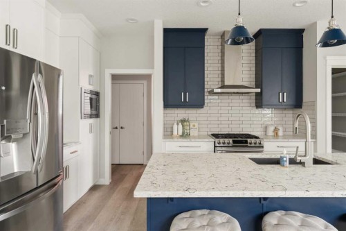 123 Crestridge Hill Sw, Calgary, AB - Indoor Photo Showing Kitchen With Upgraded Kitchen