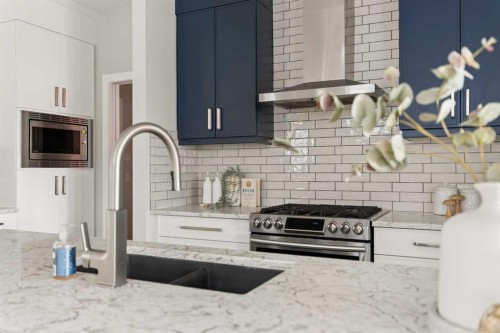 123 Crestridge Hill Sw, Calgary, AB - Indoor Photo Showing Kitchen With Upgraded Kitchen