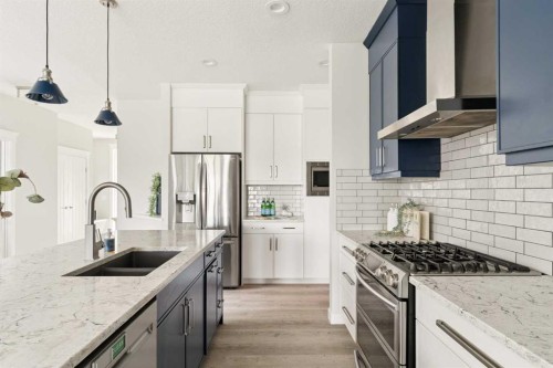 123 Crestridge Hill Sw, Calgary, AB - Indoor Photo Showing Kitchen With Double Sink With Upgraded Kitchen