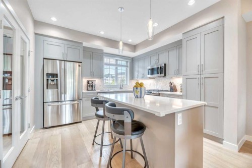 6 Quarry Gate Se, Calgary, AB - Indoor Photo Showing Kitchen With Stainless Steel Kitchen With Upgraded Kitchen