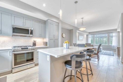 6 Quarry Gate Se, Calgary, AB - Indoor Photo Showing Kitchen With Stainless Steel Kitchen With Upgraded Kitchen