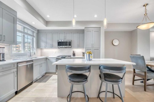 6 Quarry Gate Se, Calgary, AB - Indoor Photo Showing Kitchen With Stainless Steel Kitchen With Upgraded Kitchen