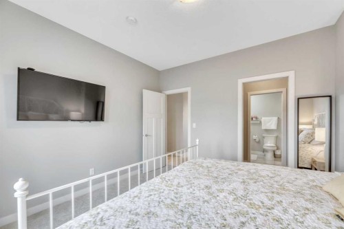6 Quarry Gate Se, Calgary, AB - Indoor Photo Showing Bedroom