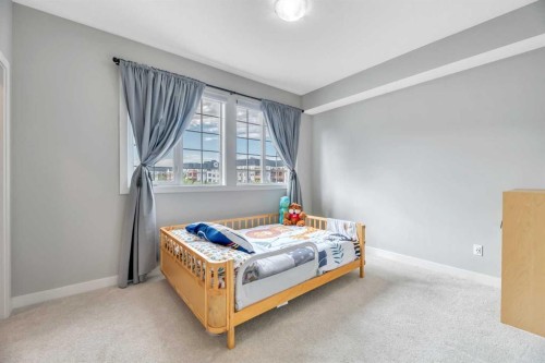 6 Quarry Gate Se, Calgary, AB - Indoor Photo Showing Bedroom
