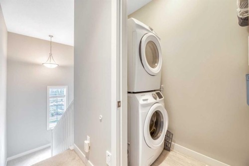 6 Quarry Gate Se, Calgary, AB - Indoor Photo Showing Laundry Room