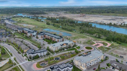 6 Quarry Gate Se, Calgary, AB - Outdoor With Body Of Water With View