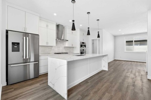 1109 Sailfin Heath, Rural Rocky View County, AB - Indoor Photo Showing Kitchen With Upgraded Kitchen
