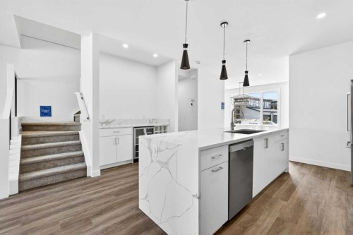 1109 Sailfin Heath, Rural Rocky View County, AB - Indoor Photo Showing Kitchen