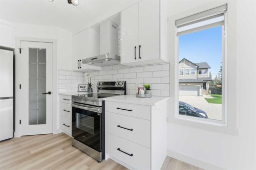 110 Tuscany Summit Green Nw, Calgary, AB - Indoor Photo Showing Kitchen
