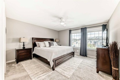 59 Heritage Heights, Cochrane, AB - Indoor Photo Showing Bedroom