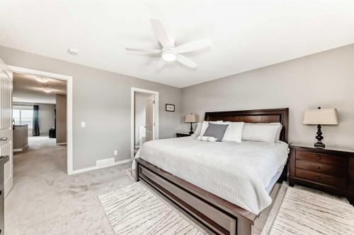 59 Heritage Heights, Cochrane, AB - Indoor Photo Showing Bedroom