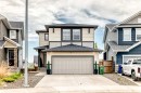 59 Heritage Heights, Cochrane, AB  - Outdoor With Facade 