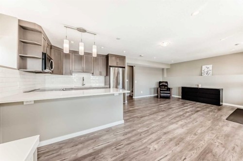 59 Heritage Heights, Cochrane, AB - Indoor Photo Showing Kitchen With Upgraded Kitchen