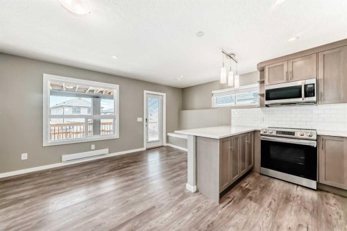 59 Heritage Heights, Cochrane, AB - Indoor Photo Showing Kitchen