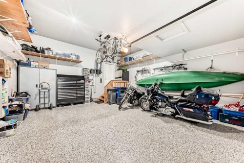 59 Heritage Heights, Cochrane, AB - Indoor Photo Showing Garage