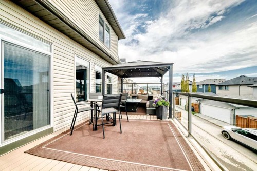 59 Heritage Heights, Cochrane, AB - Outdoor With Deck Patio Veranda With Exterior