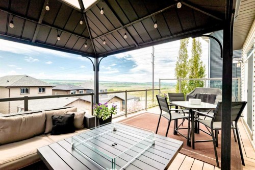 59 Heritage Heights, Cochrane, AB - Outdoor With Deck Patio Veranda With Exterior