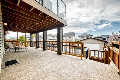 59 Heritage Heights, Cochrane, AB - Outdoor With Deck Patio Veranda With Exterior