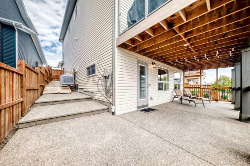 59 Heritage Heights, Cochrane, AB - Outdoor With Deck Patio Veranda With Exterior