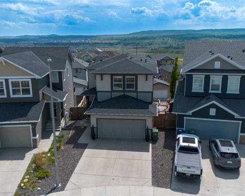 59 Heritage Heights, Cochrane, AB - Outdoor With Facade