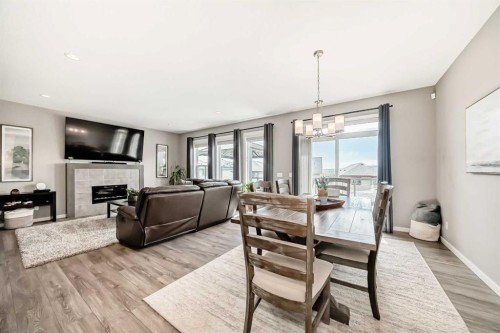 59 Heritage Heights, Cochrane, AB - Indoor Photo Showing Living Room With Fireplace