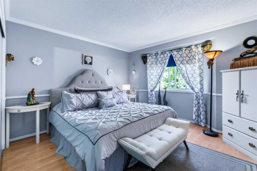 159 Fresno Place Ne, Calgary, AB - Indoor Photo Showing Bedroom