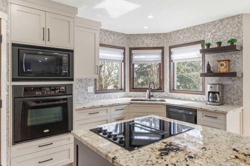 42 Evergreen Terrace Sw, Calgary, AB - Indoor Photo Showing Kitchen With Upgraded Kitchen