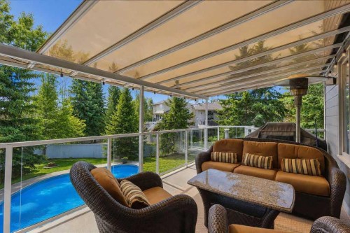42 Evergreen Terrace Sw, Calgary, AB - Outdoor With Deck Patio Veranda With Exterior