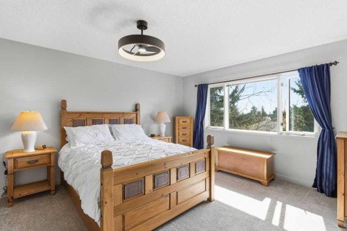 42 Evergreen Terrace Sw, Calgary, AB - Indoor Photo Showing Bedroom