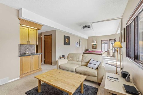 42 Evergreen Terrace Sw, Calgary, AB - Indoor Photo Showing Living Room