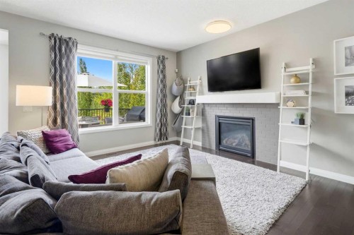 236 Auburn Springs Close Se, Calgary, AB - Indoor Photo Showing Living Room With Fireplace
