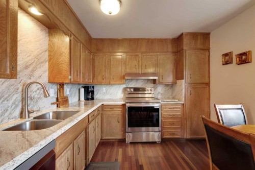 1296 Berkley Drive Nw, Calgary, AB - Indoor Photo Showing Kitchen With Double Sink