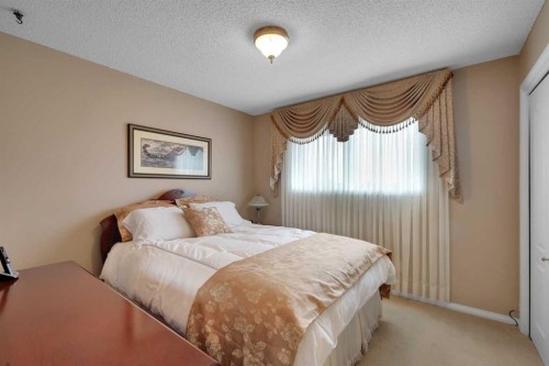 1296 Berkley Drive Nw, Calgary, AB - Indoor Photo Showing Bedroom