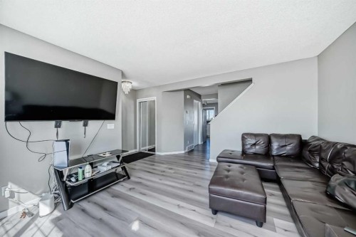 111 Martin Crossing Close Ne, Calgary, AB - Indoor Photo Showing Living Room