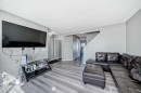 111 Martin Crossing Close Ne, Calgary, AB  - Indoor Photo Showing Living Room 
