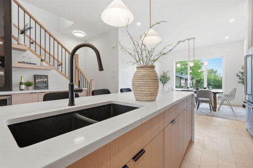2105B 7 Street Ne, Calgary, AB - Indoor Photo Showing Kitchen With Double Sink