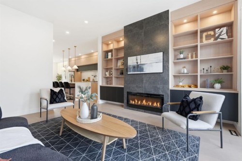 2105B 7 Street Ne, Calgary, AB - Indoor Photo Showing Living Room With Fireplace