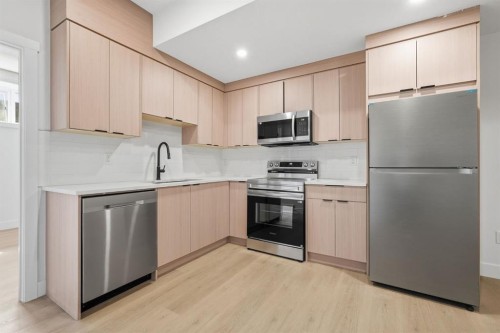 2105B 7 Street Ne, Calgary, AB - Indoor Photo Showing Kitchen With Stainless Steel Kitchen