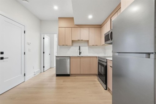 2105B 7 Street Ne, Calgary, AB - Indoor Photo Showing Kitchen With Stainless Steel Kitchen
