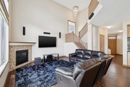 47 Silverado Skies Manor Sw, Calgary, AB - Indoor Photo Showing Living Room With Fireplace