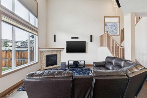 47 Silverado Skies Manor Sw, Calgary, AB - Indoor Photo Showing Living Room With Fireplace